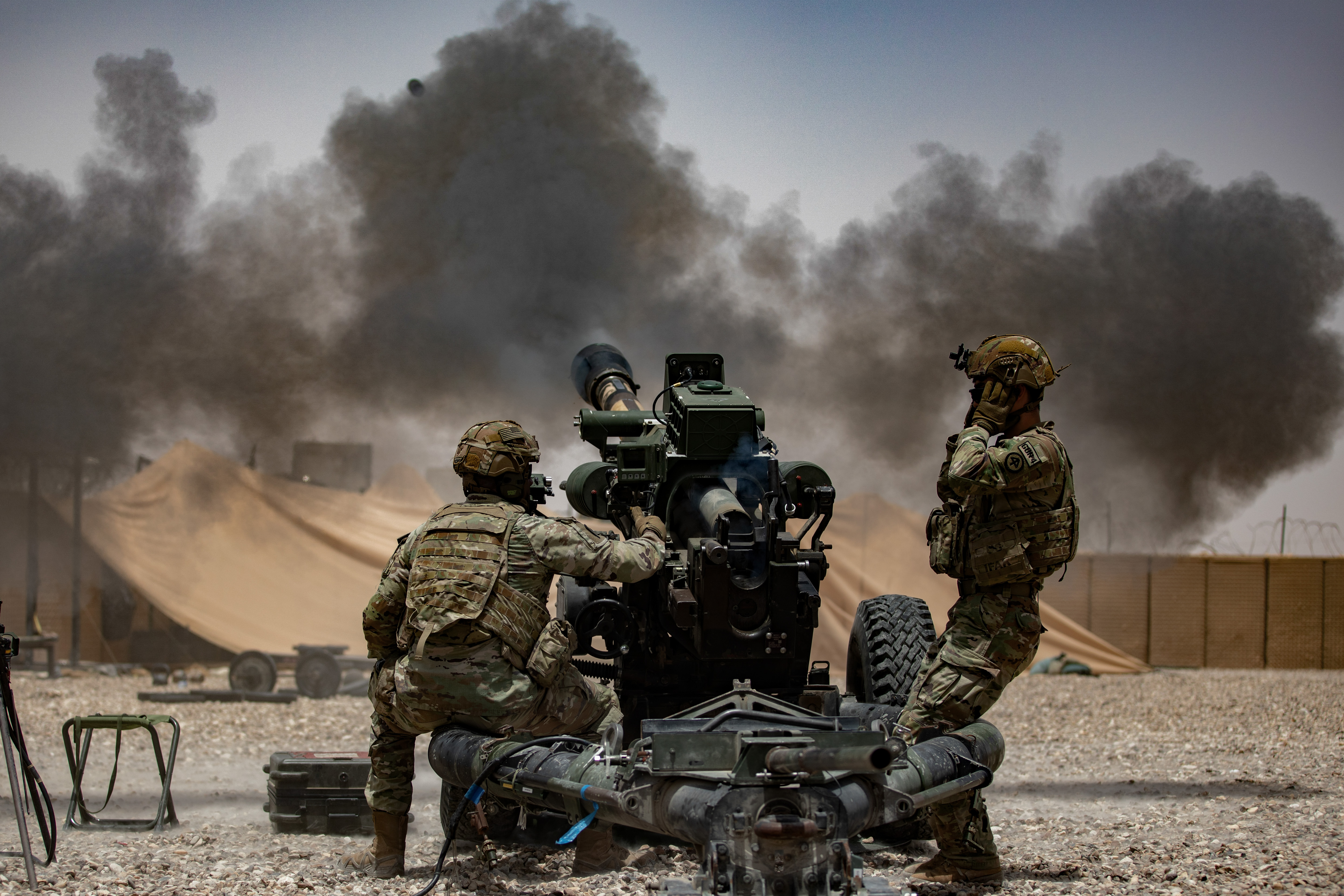 Army Soldiers of Bravo Battery, 3rd Battalion, 112th Field Artillery Regiment, 44th Infantry Brigade Combat Team, New Jersey Army National Guard,conduct live-fire exercise using M119 howitzer, in Iraq, May 28, 2024 (U.S. Army National Guard/Bruce Daddis)